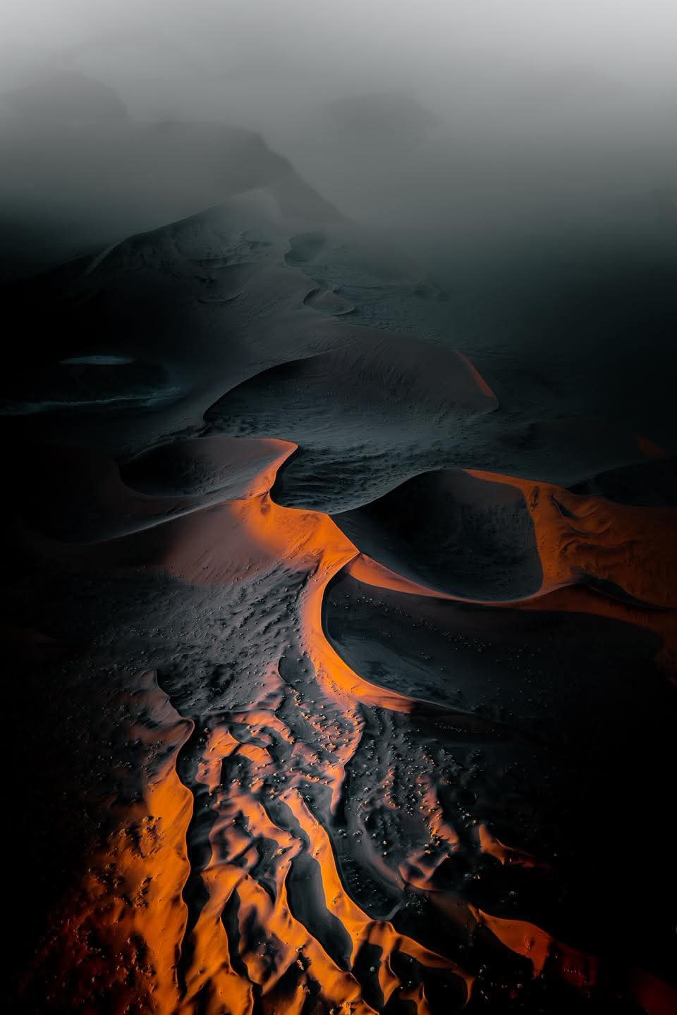 Sunrise over misty valley